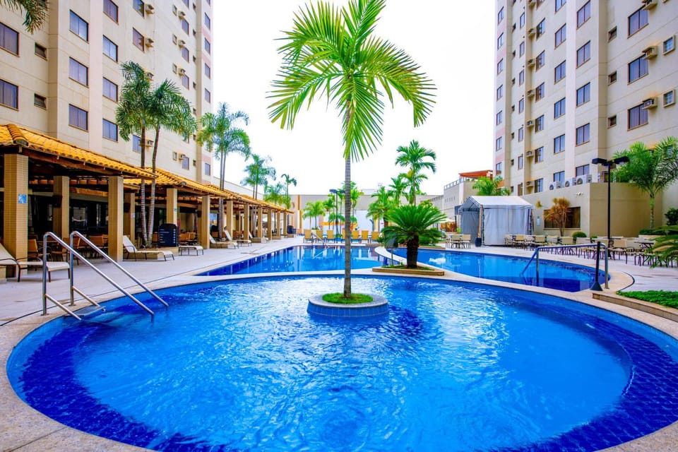 Property building, Day, Pool view, Swimming pool, sunbed