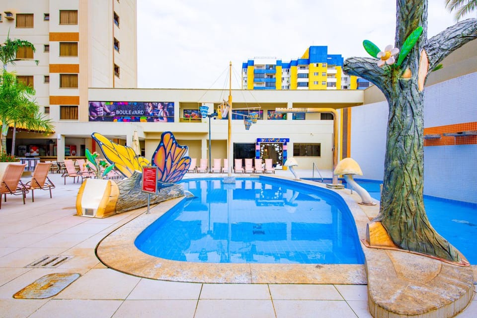 Property building, Day, Pool view, Swimming pool, sunbed