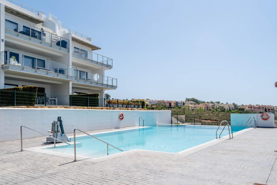 Property building, Patio, View (from property/room), Balcony/Terrace, Pool view, Swimming pool, sunbed