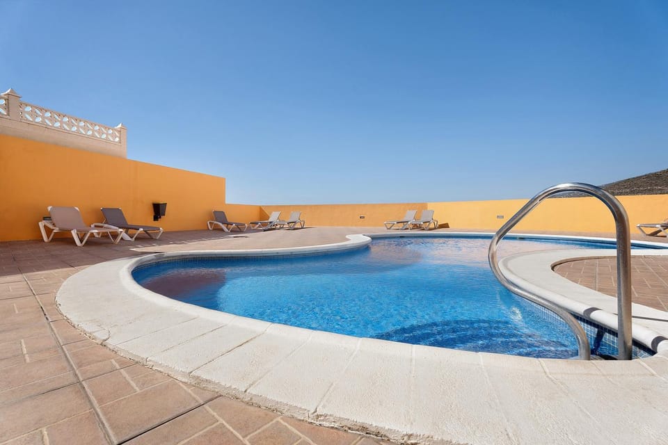 Property building, Living room, Swimming pool