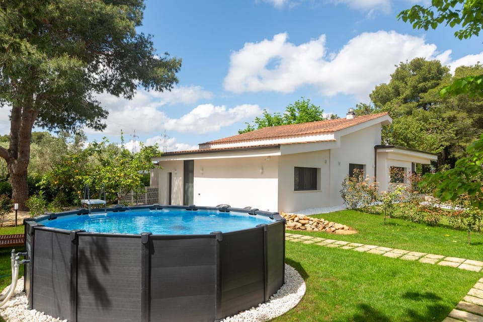 Property building, Natural landscape, Garden, Pool view
