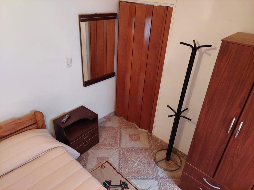 Bed, wardrobe