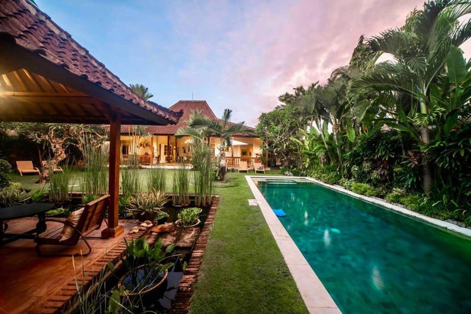 Property building, Patio, Day, Natural landscape, Garden, Garden view, Pool view, Swimming pool