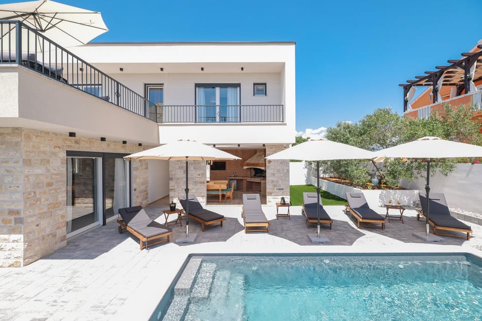 Property building, Patio, Day, View (from property/room), Balcony/Terrace, Seating area, Pool view, Swimming pool, sunbed