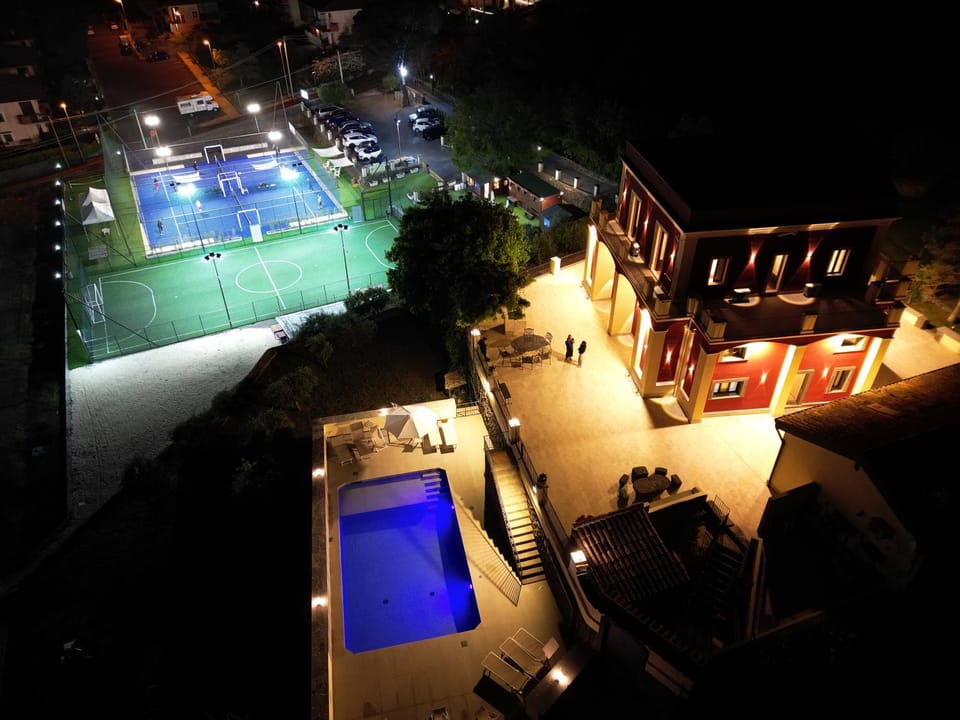 Property building, Night, Bird's eye view, Pool view, Swimming pool