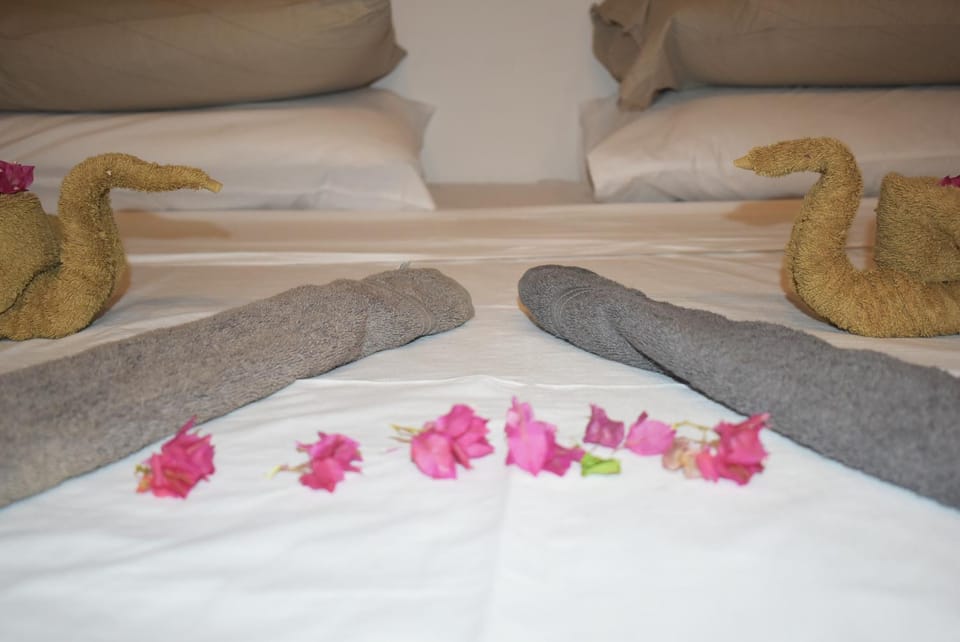 Bed, Photo of the whole room, Bedroom, towels, air conditioner, air conditioner