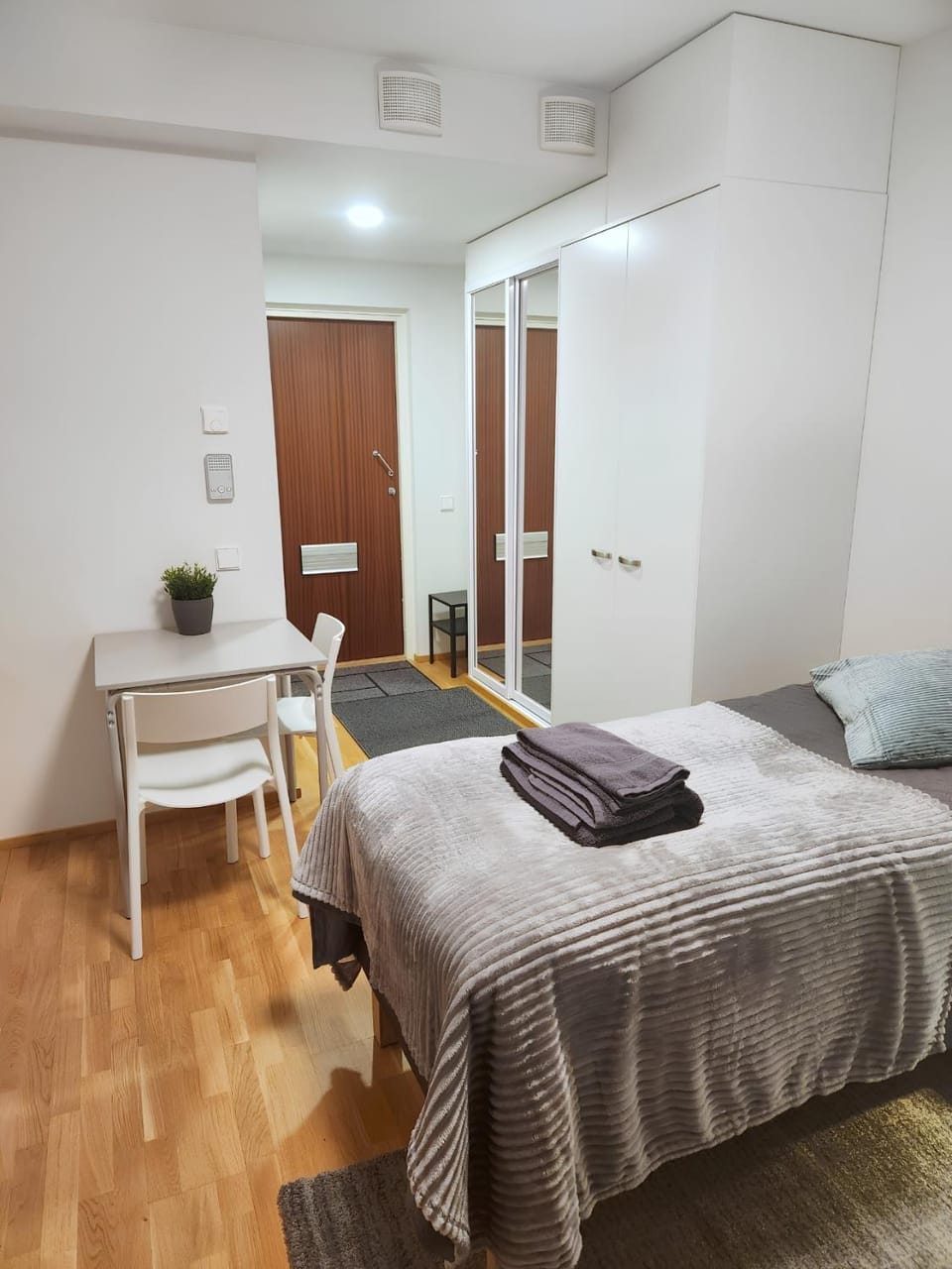 Bed, Dining area, flat iron, towels, towels