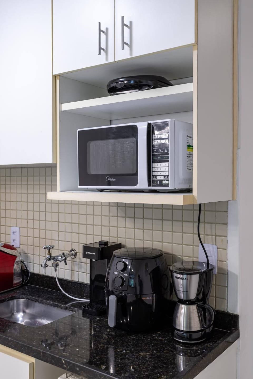 Kitchen or kitchenette, microwave