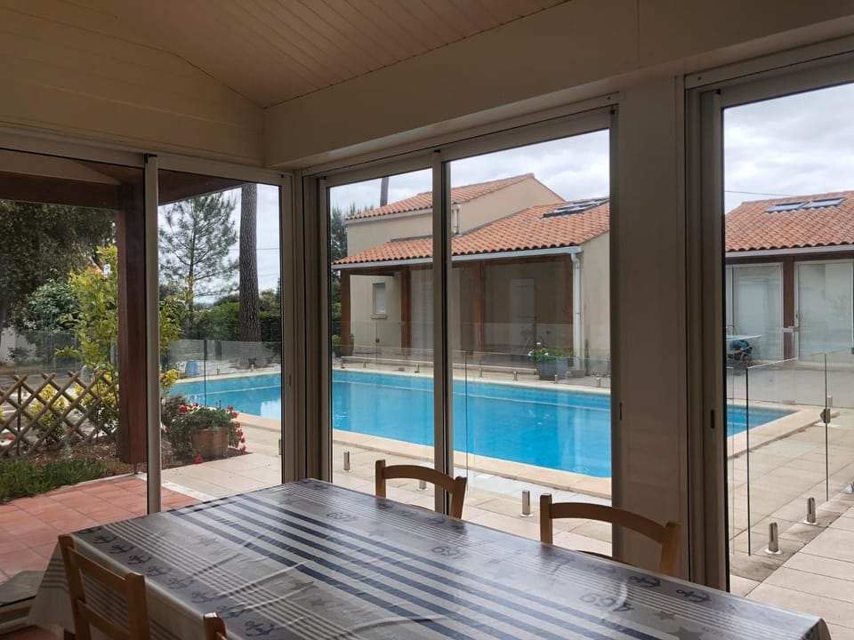 Property building, Living room, Swimming pool