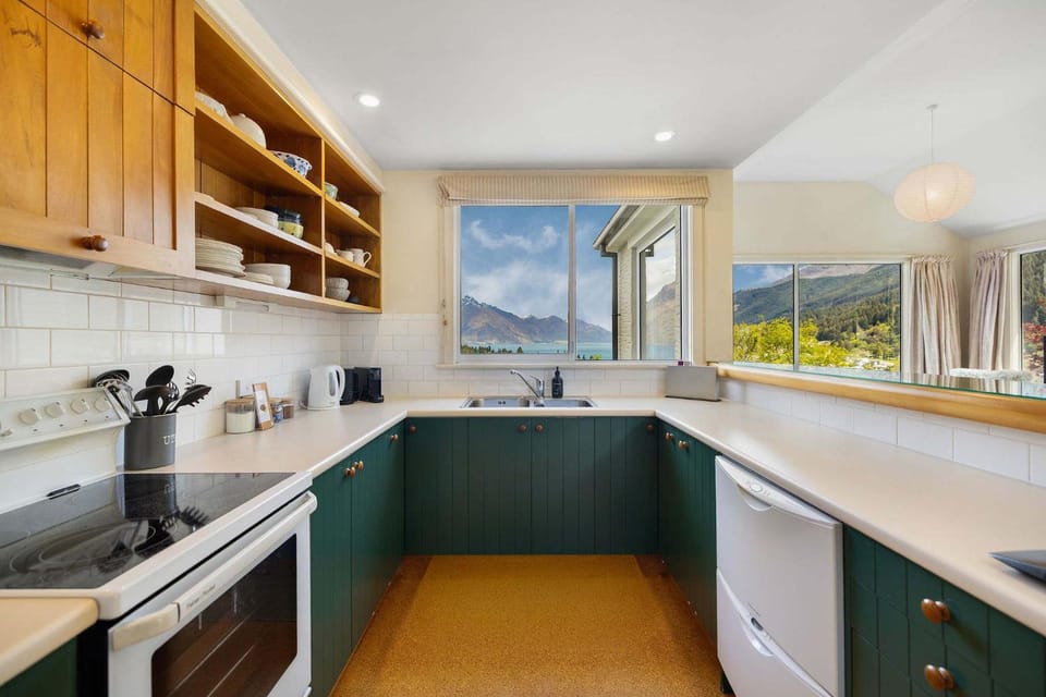 Kitchen or kitchenette, dishwasher, oven, stove, toaster