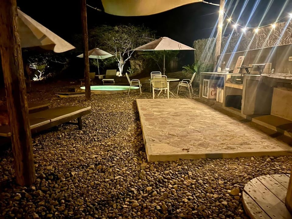 Patio, Night, Balcony/Terrace, Seating area, Pool view, Swimming pool