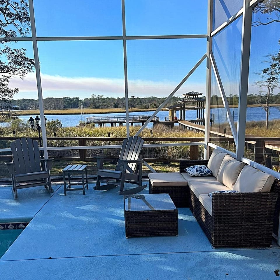 View (from property/room), Seating area, Pool view, River view