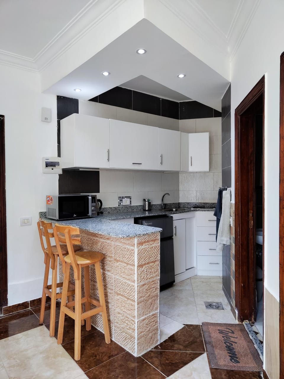 Kitchen or kitchenette, stove