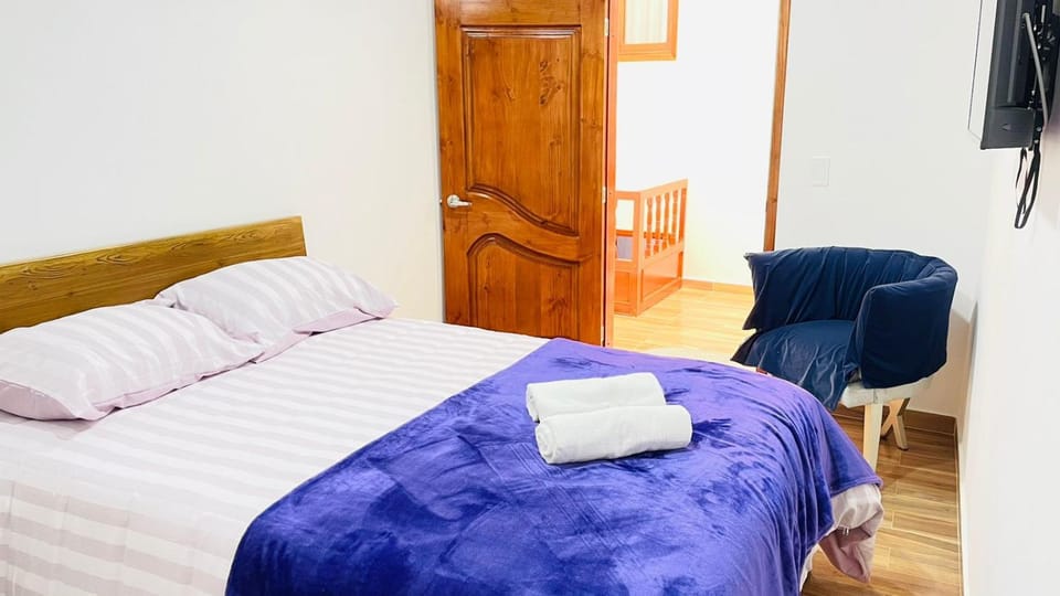 Bed, TV and multimedia, Bedroom, towels, wardrobe
