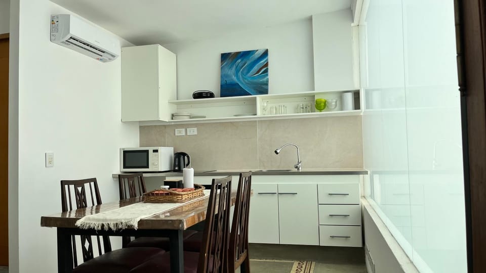 Dining area, oven, stove, air conditioner