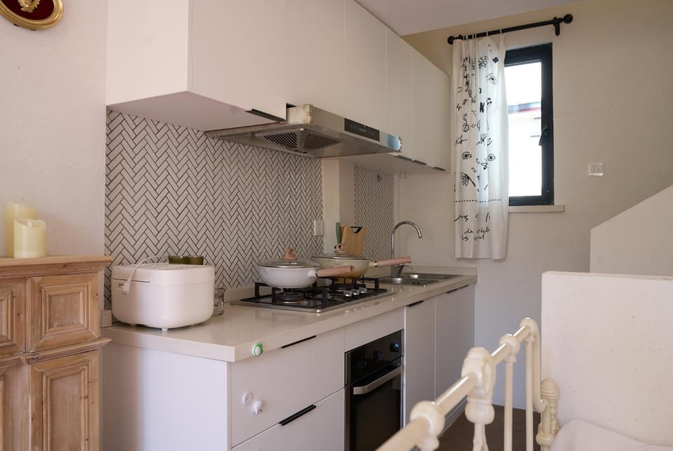Kitchen or kitchenette, stove