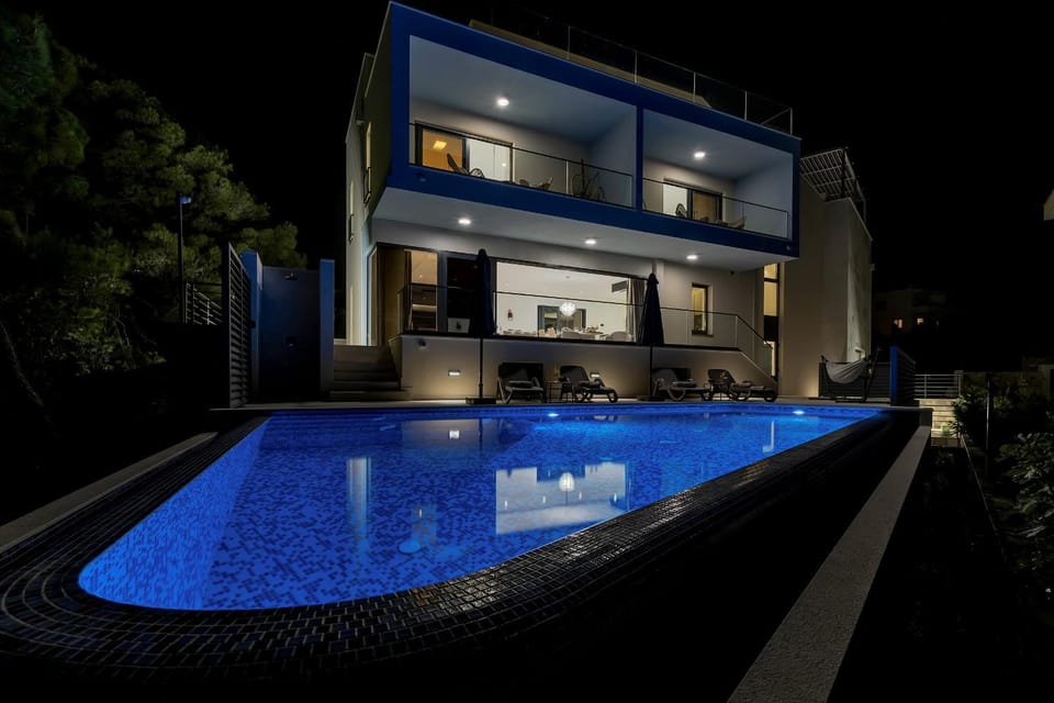 Property building, Night, Swimming pool