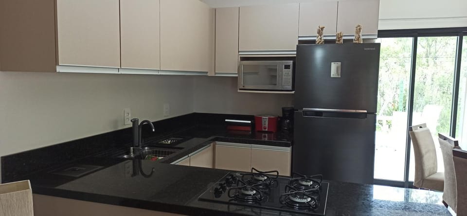 Kitchen or kitchenette, microwave
