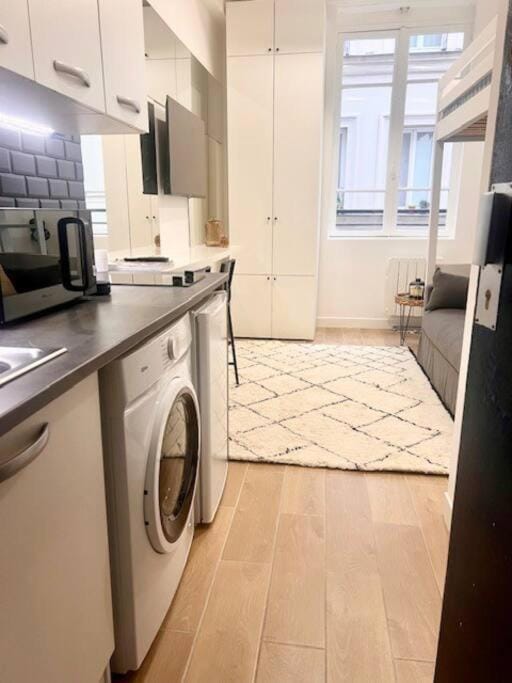 Kitchen or kitchenette, washing machine