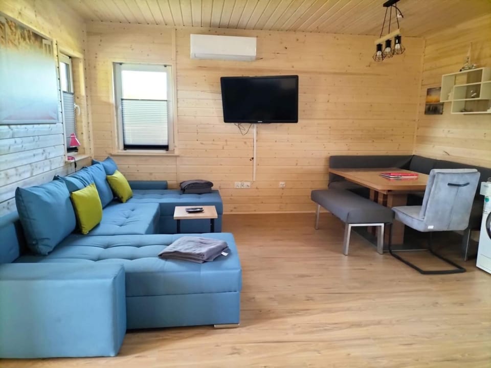 Ferienhaus Baltica 55qm bis 6 Gäste mit Sauna, Whirlpool, gemütlicher Terrasse, eingezäuntem Garten & bis zu 6 Hunde kostenlos House in West Pomeranian Voivodeship, Poland