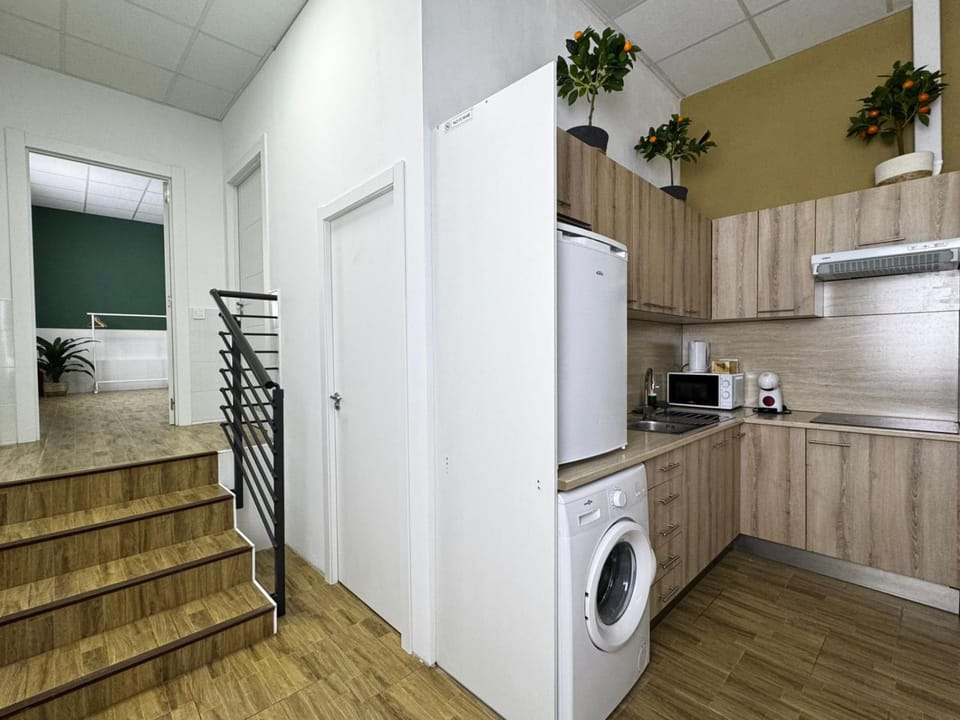 Kitchen or kitchenette, washing machine