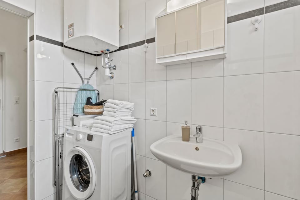 Bathroom, towels, washing machine