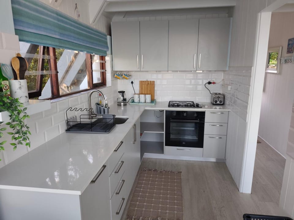 Kitchen or kitchenette, oven, stove, toaster