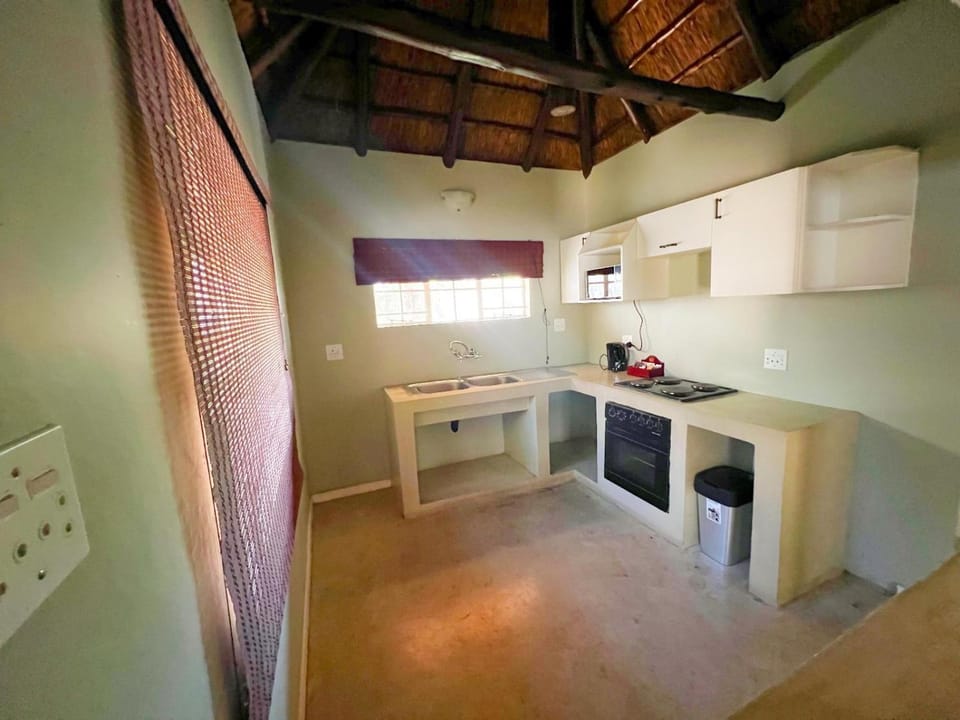 Kitchen or kitchenette, oven, stove
