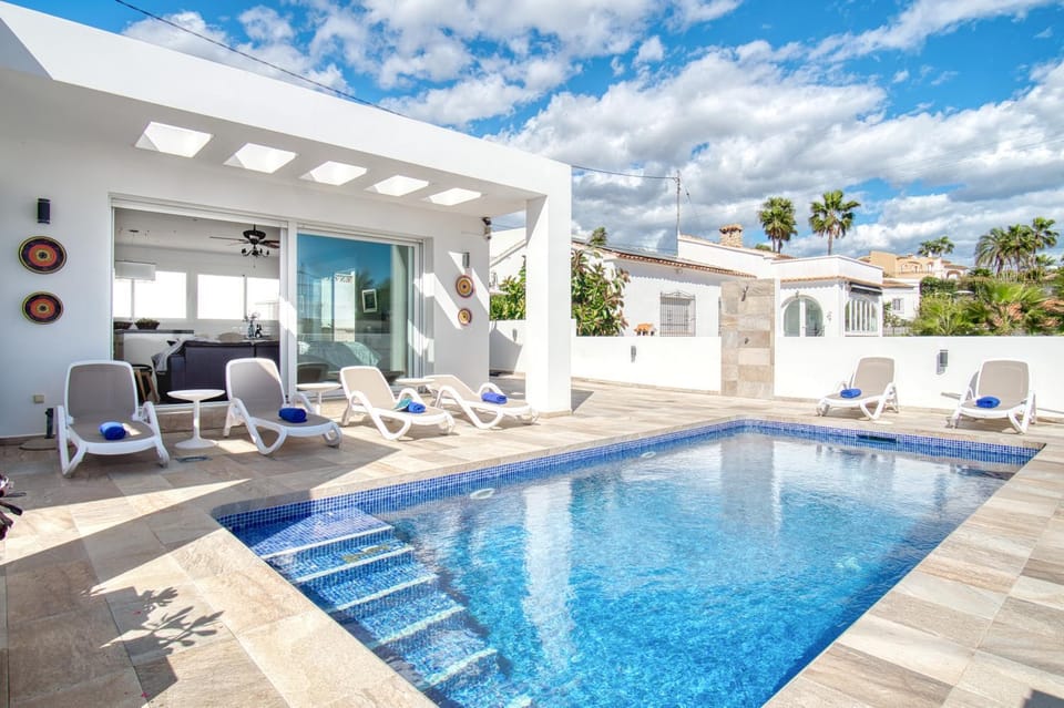 Property building, Living room, Swimming pool