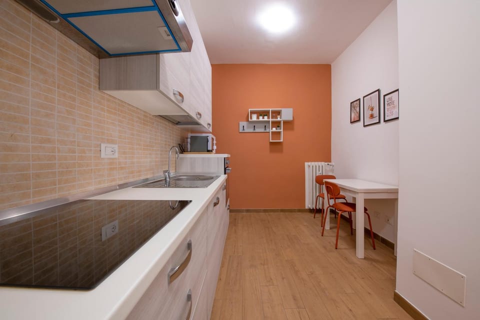 Kitchen or kitchenette, stove