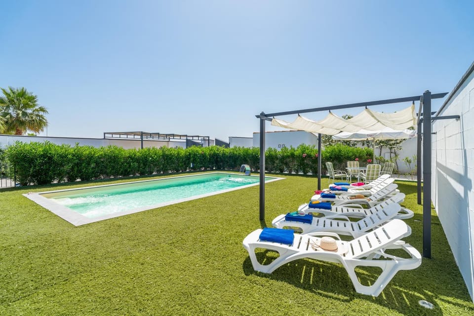Property building, Living room, Swimming pool