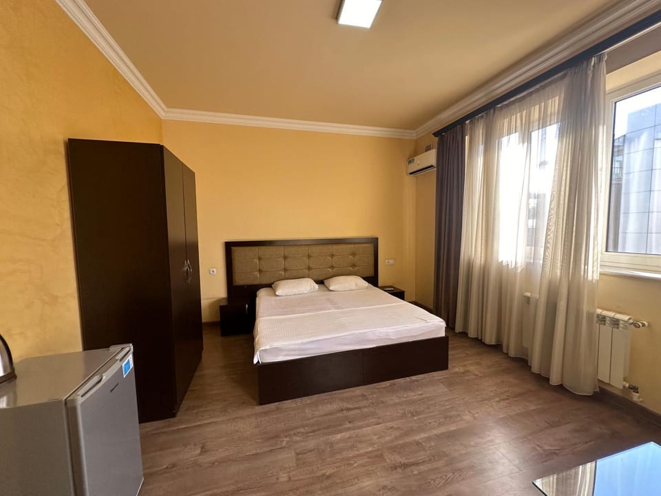 Bed, wardrobe, air conditioner