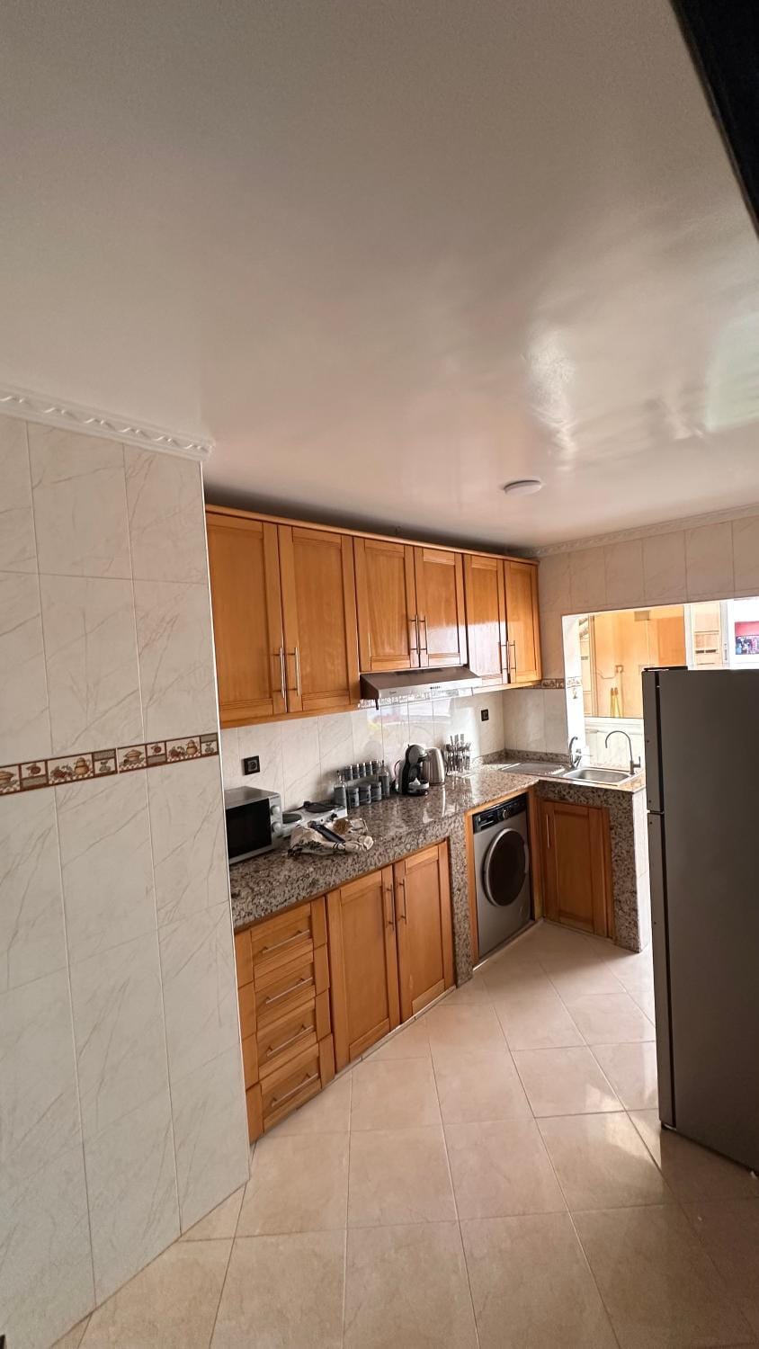 Kitchen or kitchenette, oven, stove, toaster