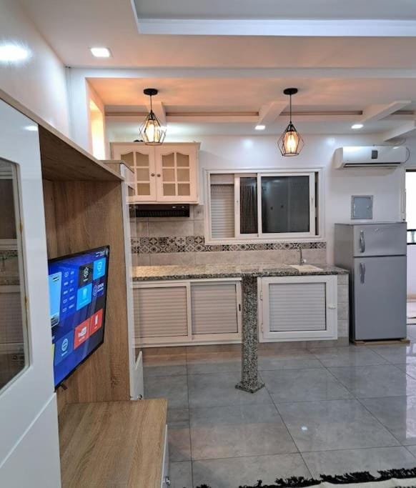 Kitchen or kitchenette, oven