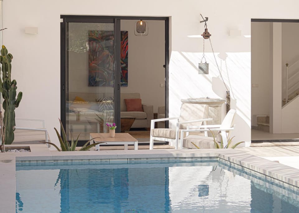Patio, Day, Pool view, Swimming pool, sunbed
