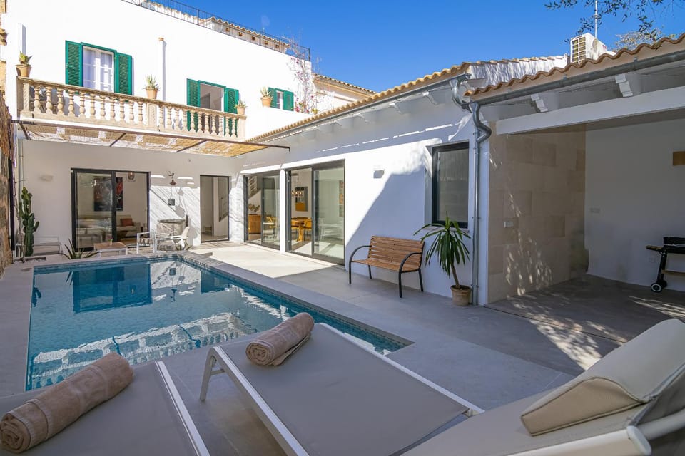 Property building, Patio, Off site, Day, Pool view, Swimming pool, sunbed