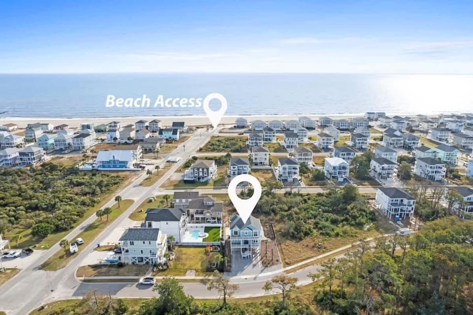 Coastal Charm Ocean Isle Beach custom beach home with 4 bedroom, 3 bath home with pool and elevator House in Ocean Isle Beach