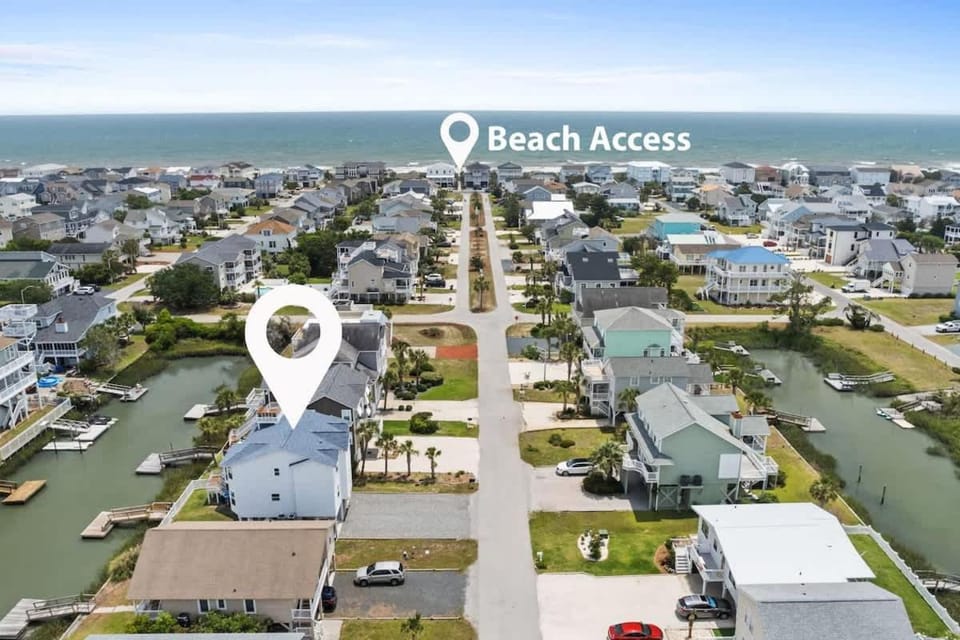 Latitude Adjustment by Brunswick Vacation Rentals Canal front with dock House in Ocean Isle Beach
