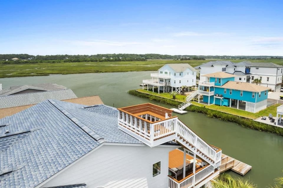 Latitude Adjustment by Brunswick Vacation Rentals Canal front with dock House in Ocean Isle Beach