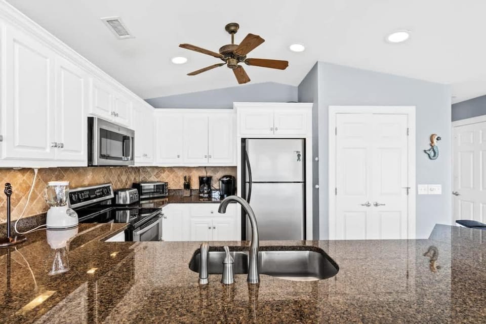 Rainbow's End Brunswick Vacation Rentals Ocean front with private heated pool House in Holden Beach