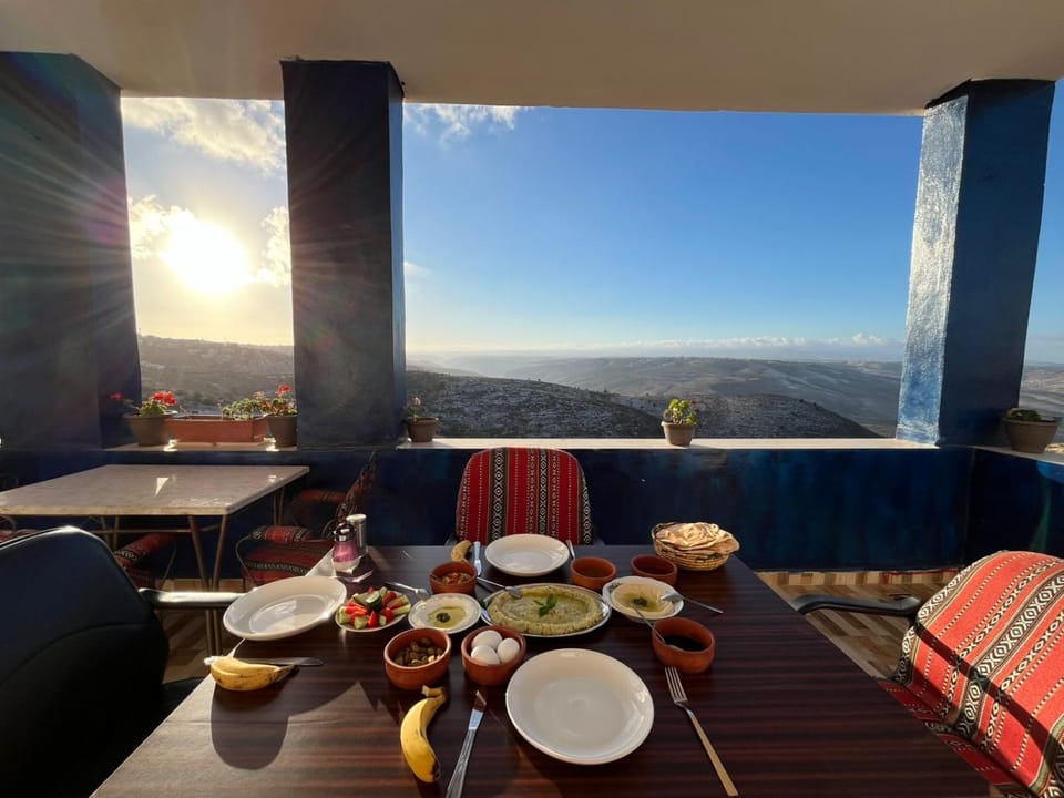 Natural landscape, Food and drinks, Dining area, Food, Mountain view, Breakfast, Continental breakfast