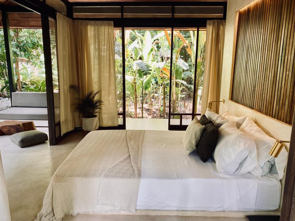 Bed, Natural landscape, Garden, Living room, Seating area, Bedroom