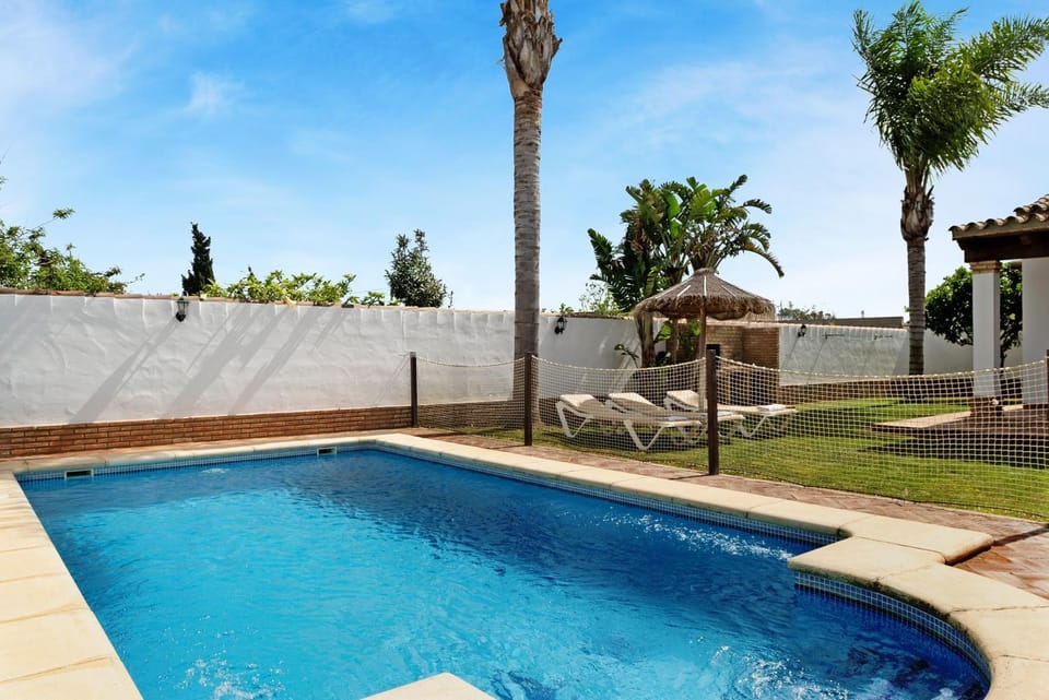 Property building, Living room, Swimming pool