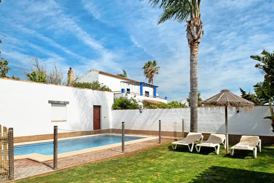 Property building, Living room, Swimming pool