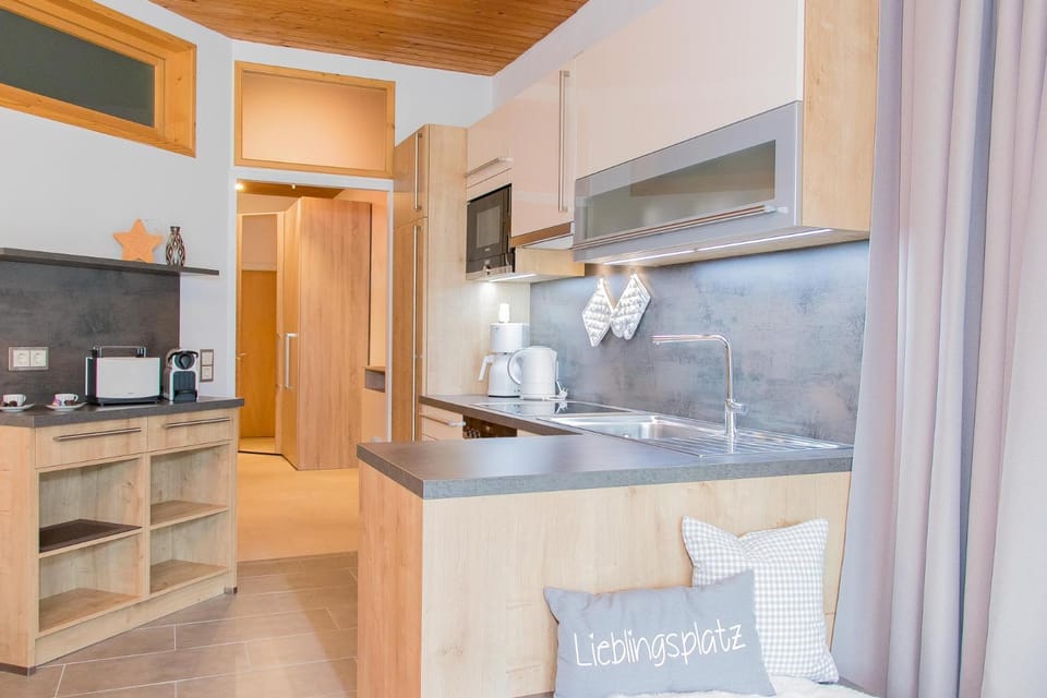 Kitchen or kitchenette, oven, stove, toaster