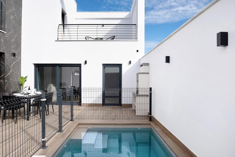 Property building, Living room, Swimming pool