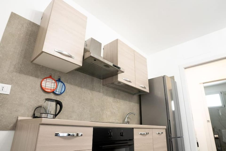Kitchen or kitchenette, oven, stove