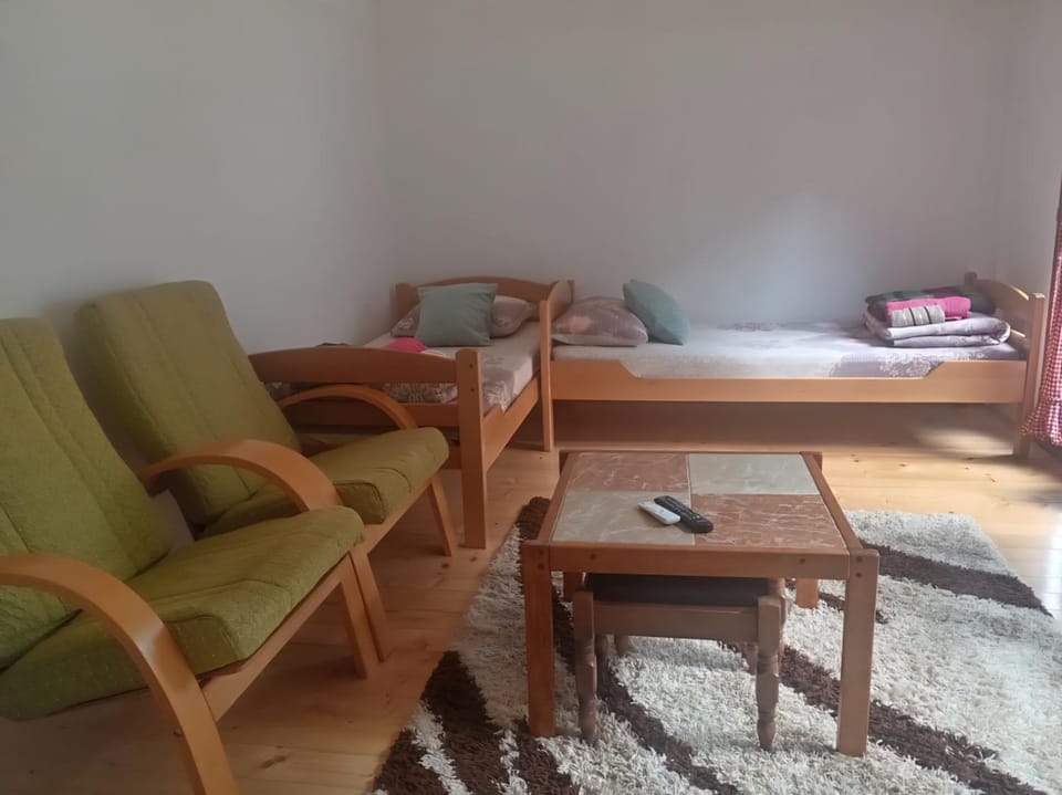 Bed, Living room, Seating area