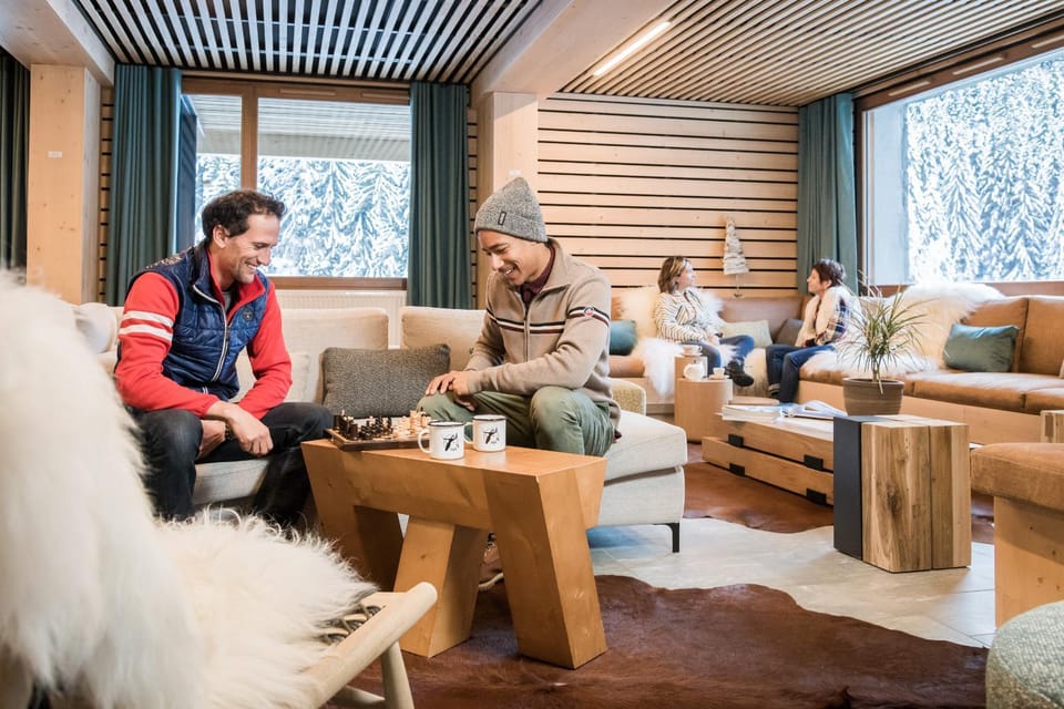 People, Living room, Seating area, group of guests