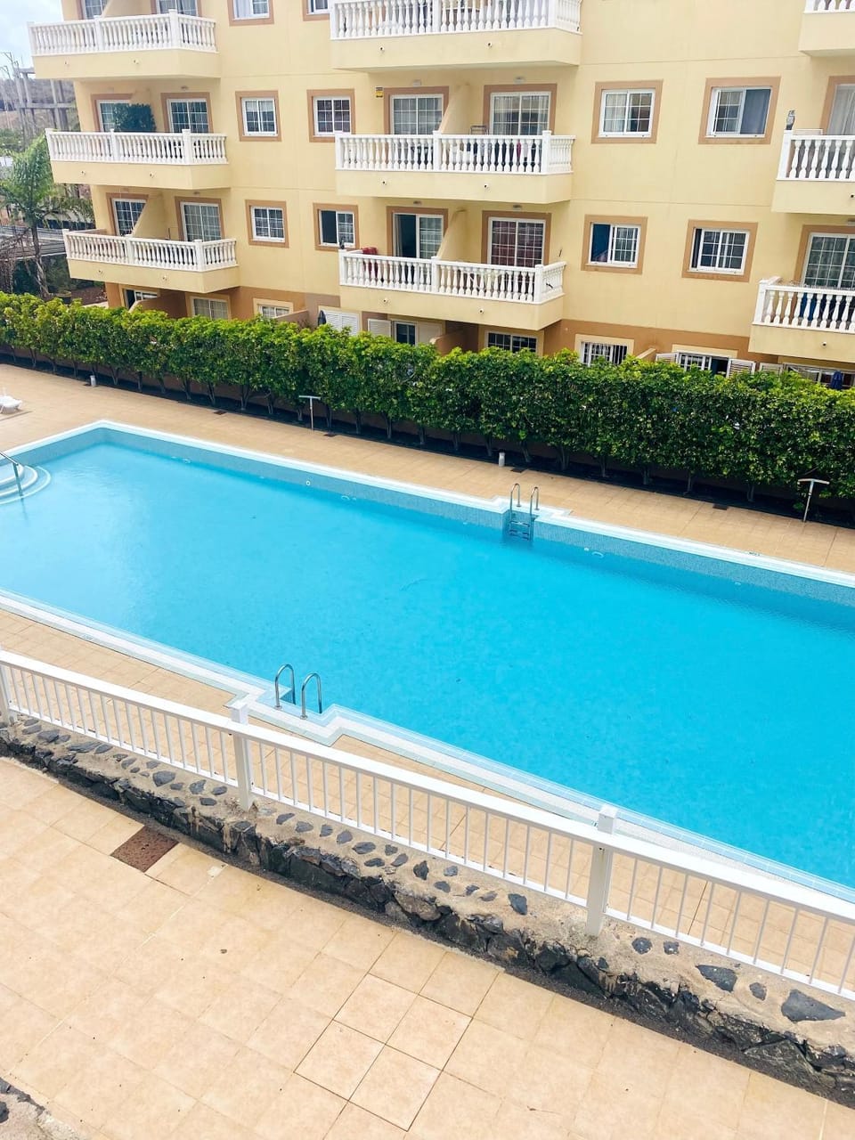 Property building, Facade/entrance, View (from property/room), Pool view, Swimming pool, sunbed